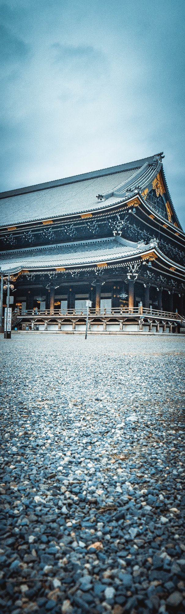 Traditional Japanese temple in Osaka with intricate wooden architecture.